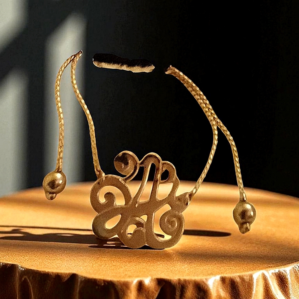 Monogram silver tone Bracelet.